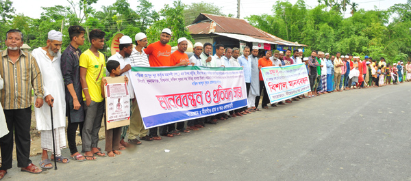 বিশ্বনাথে মামলা দিয়ে গ্রামবাসীকে হয়রানীর প্রতিবাদে  মানববন্ধন