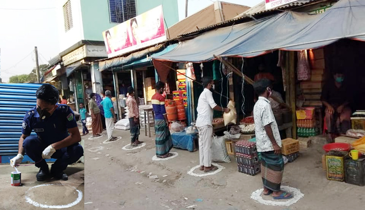করোনা ভাইরাস প্রতিরোধে গোয়াইনঘাটে দূরত্ব বজায় রাখতে গোল বৃত্ত এঁকে দিচ্ছে পুলিশ