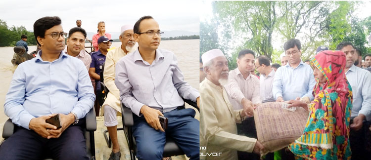 কানাইঘাটের বন্যা দূর্গতদের মাঝে জেলা প্রশাসক’র ত্রান সামগ্রী বিরতণ