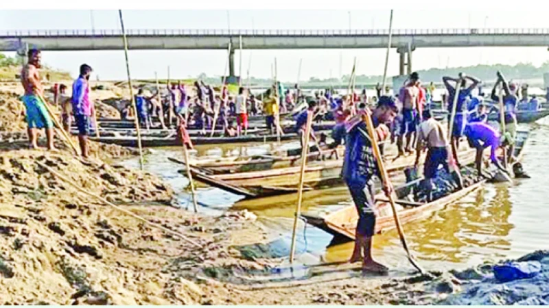 পাথর-বালু উত্তোলনে হুমকিতে ধলাই সেতু